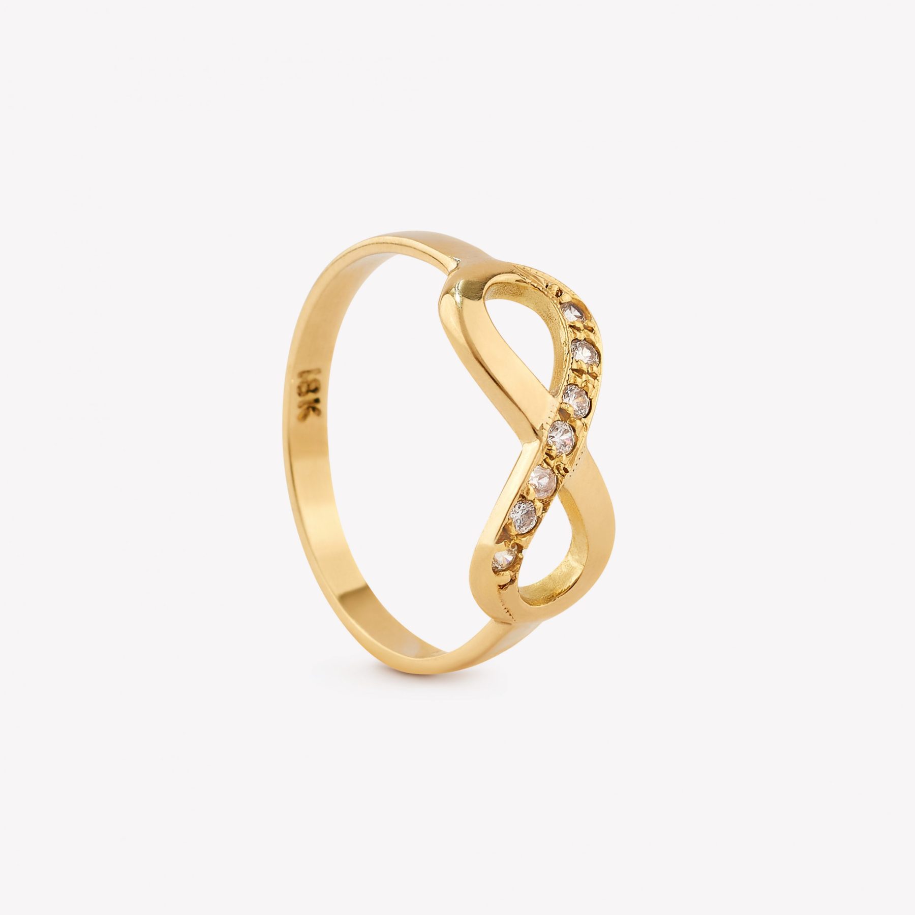 Anillo oro 18k amarillo, Infinito con 7 Brillantes Moissanitas.