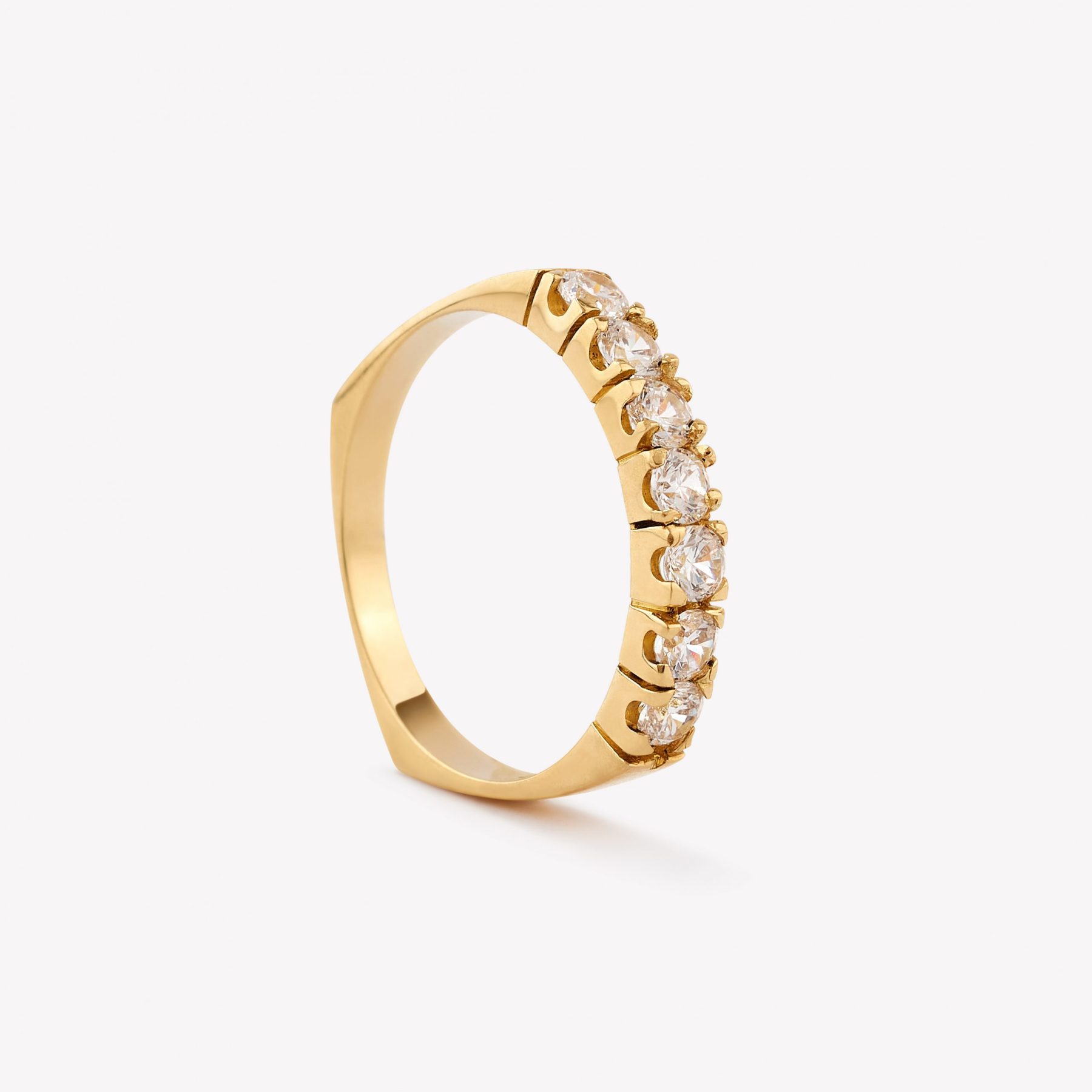 Anillo oro 18k amarillo, Rivier con 7 Circonios.