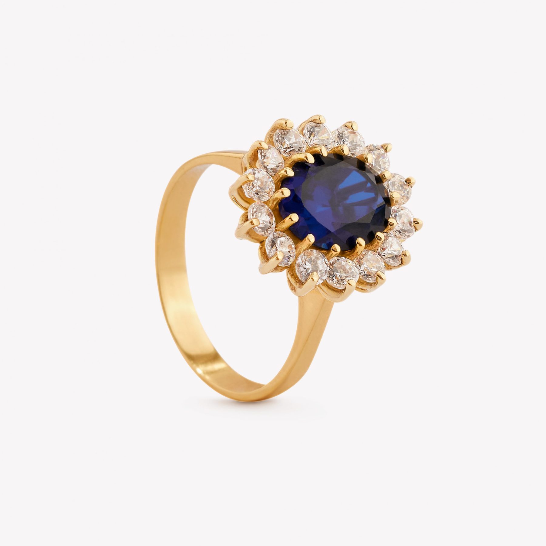 Anillo oro 18k amarillo, Roseta con Zafiro Azul Oval.