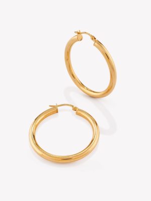 Argollas en oro 18k amarillo, Tubular de 3cm. diámetro.