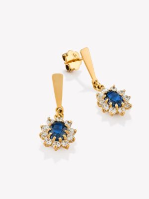 Aretes en oro 18k amarillo, Roseta con Zafiro Azul y Circonios.