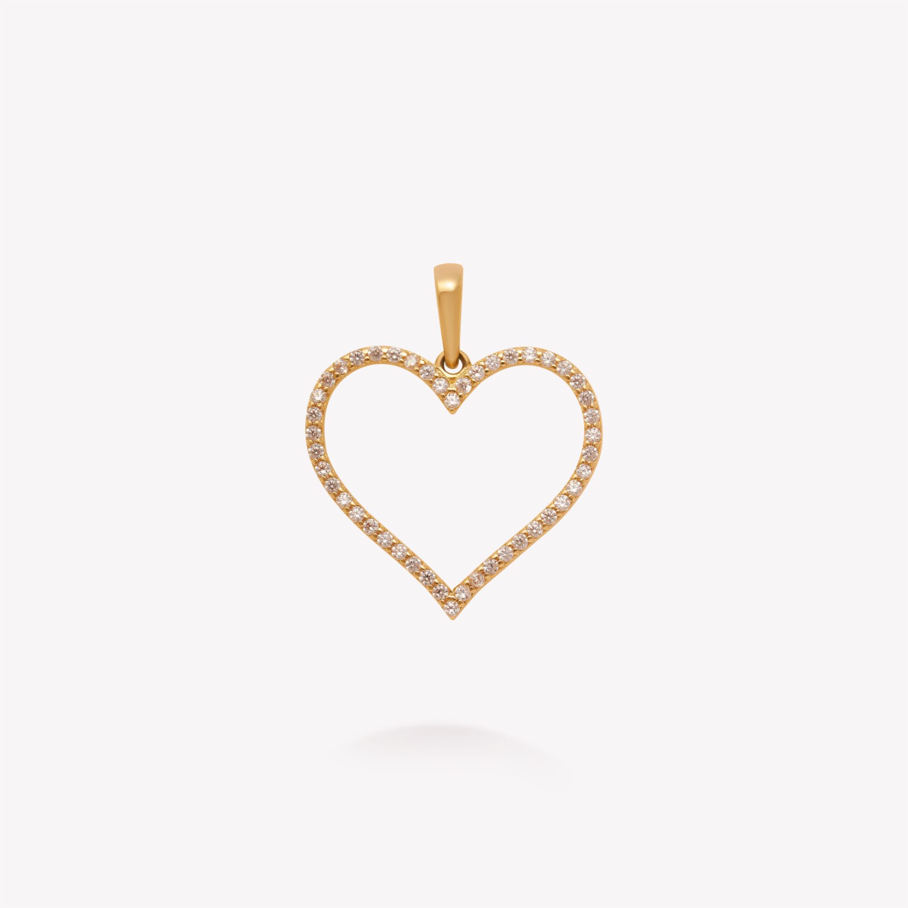Dije oro 18k amarillo, Corazón con circonios.