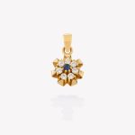 Dije oro 18k amarillo, Flor con Zafiro Azul y Circonios.