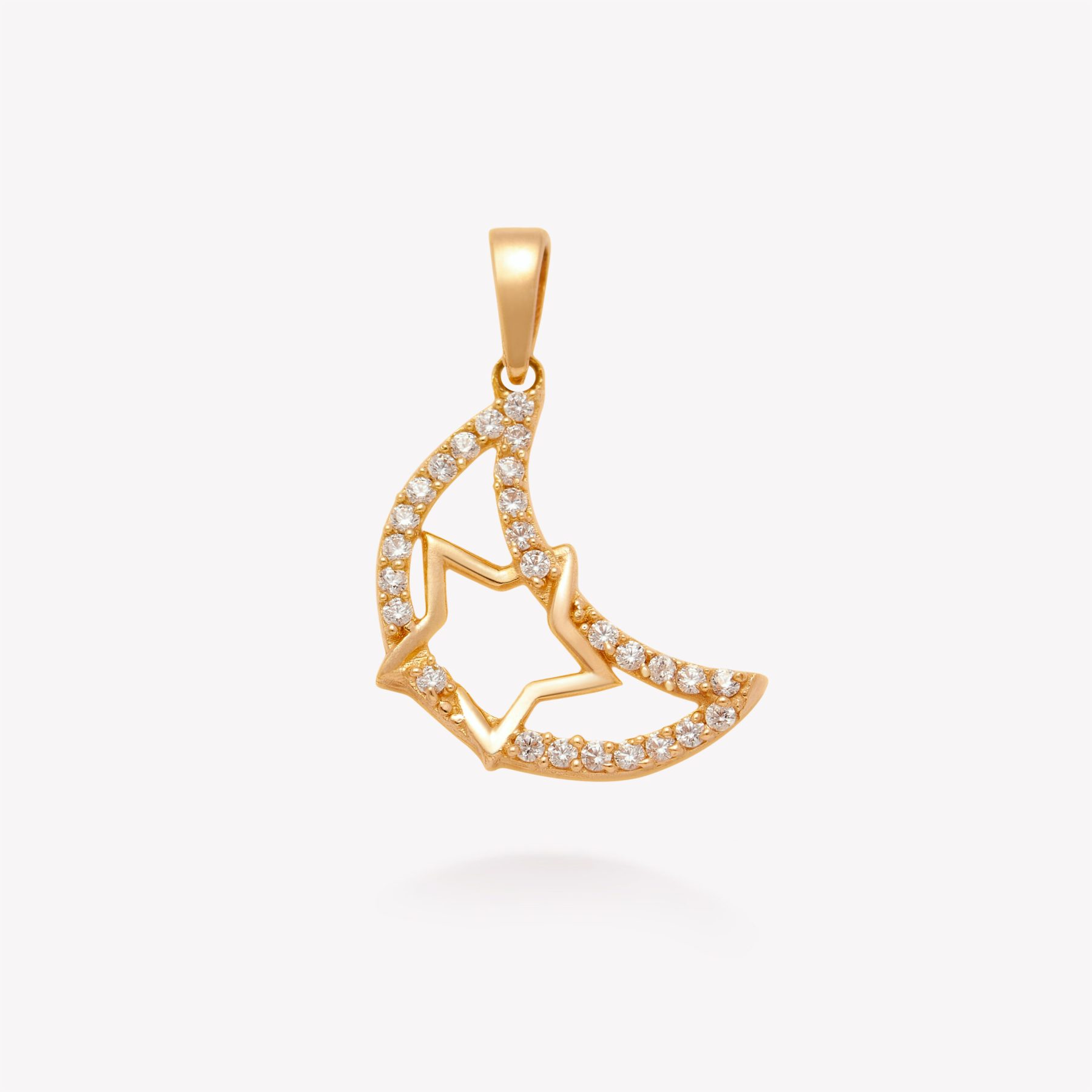 Dije oro 18k amarillo, Luna y Estrella entrelazadas.