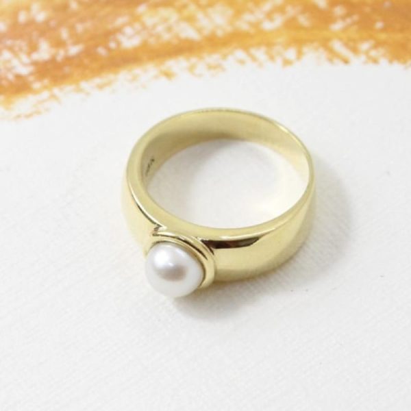 Anillo oro 18k amarillo. Aureola con Perla Cultivada de Mar.