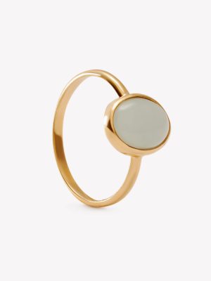 Anillo oro 18k amarillo, Bisel con Aguamarina Cabuchón Oval.