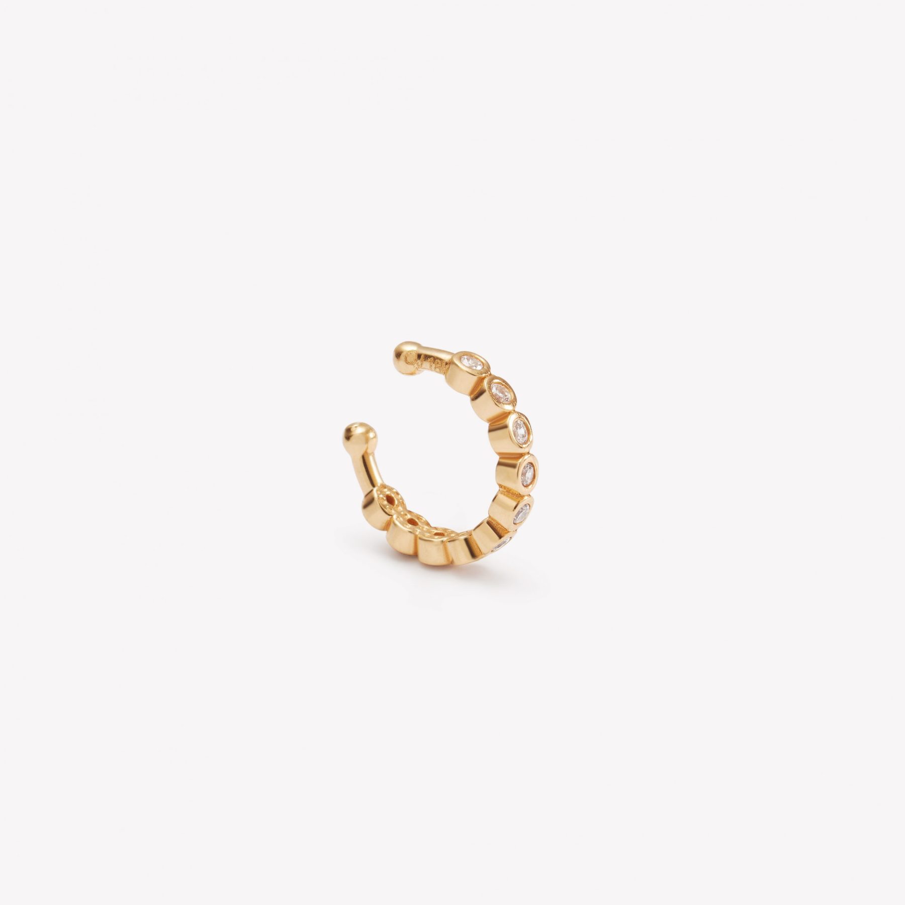 Presionador en oro 18k. amarillo con 10 Circonios.
