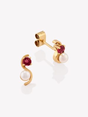 Aretes en oro 18k. amarillo, Tú y Yo con rubí.