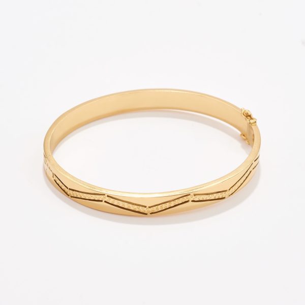 Semanario en oro 18k. amarillo con diseño Zig Zag.