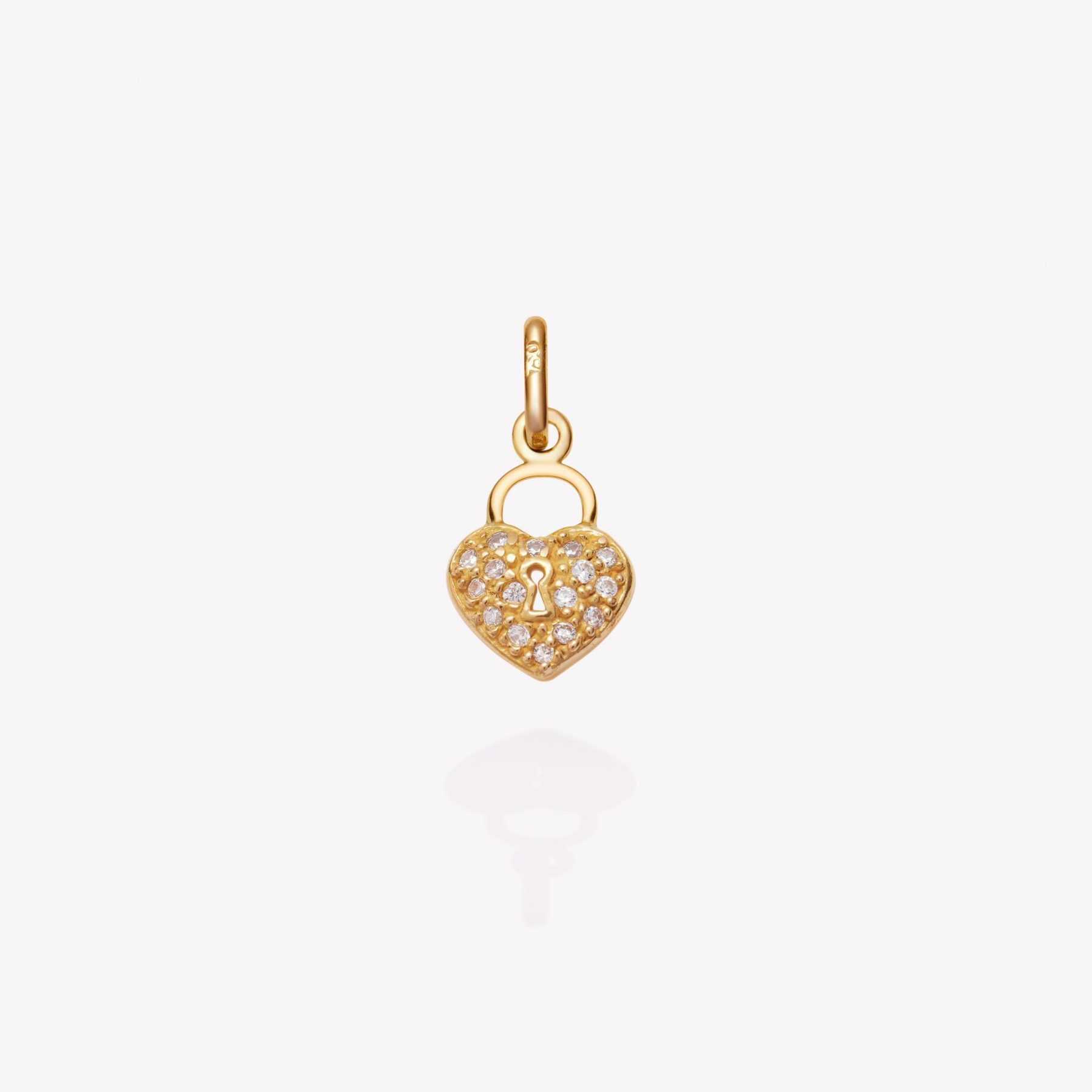 Dije oro 18k amarillo, Corazón con Circonios.