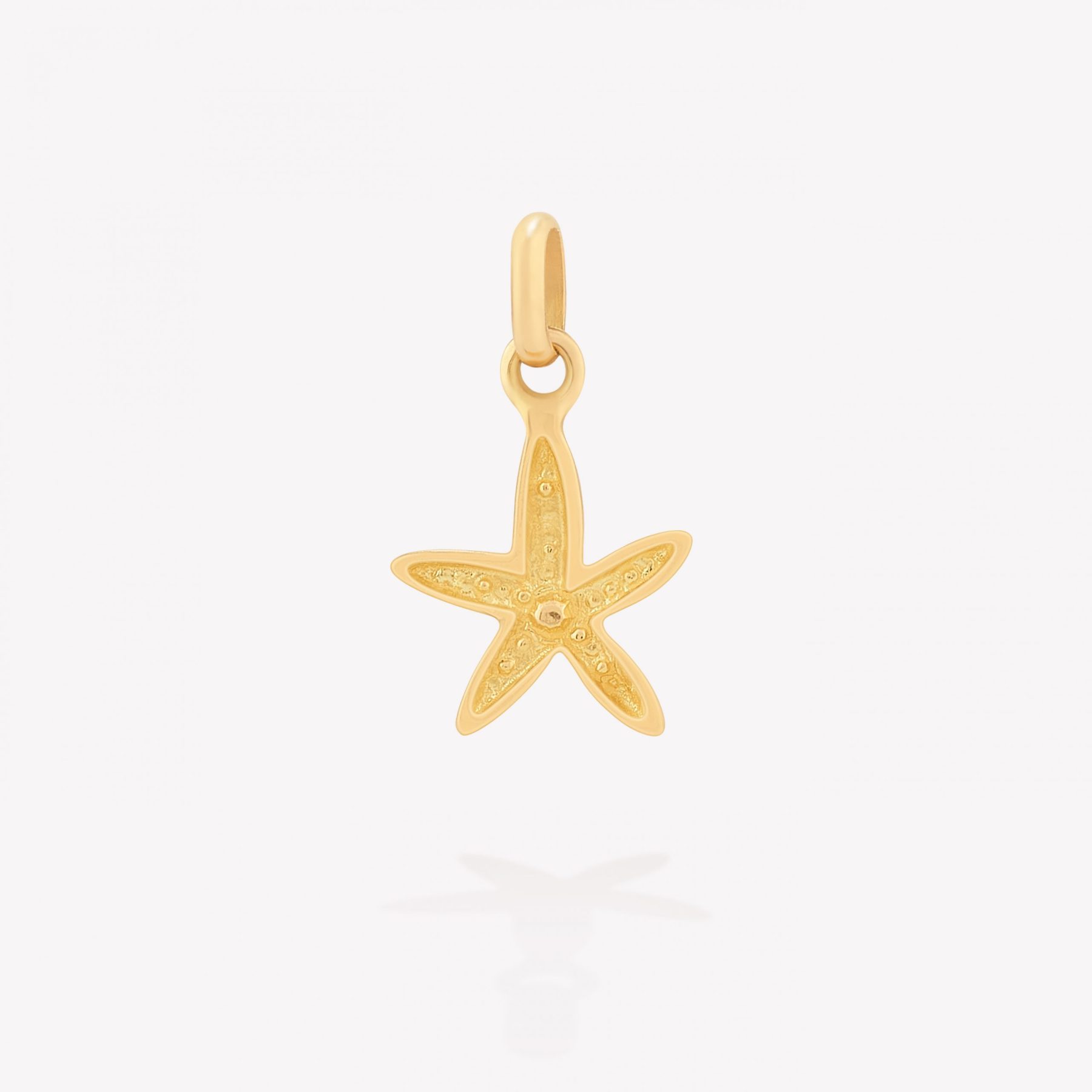 Dije oro 18k amarillo, Estrella de Mar.