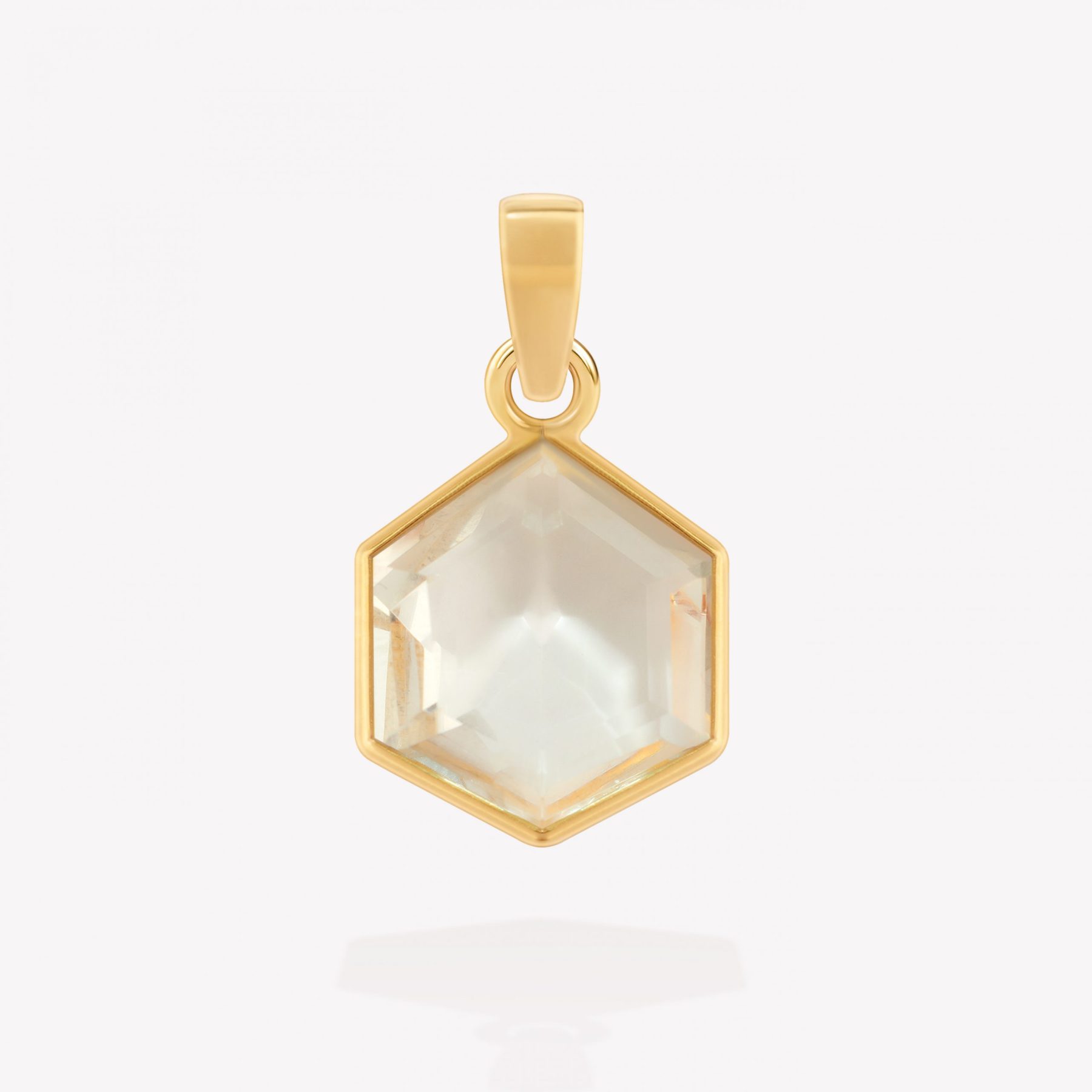 Dije oro 18k amarillo, con Cuarzo Hexágono.