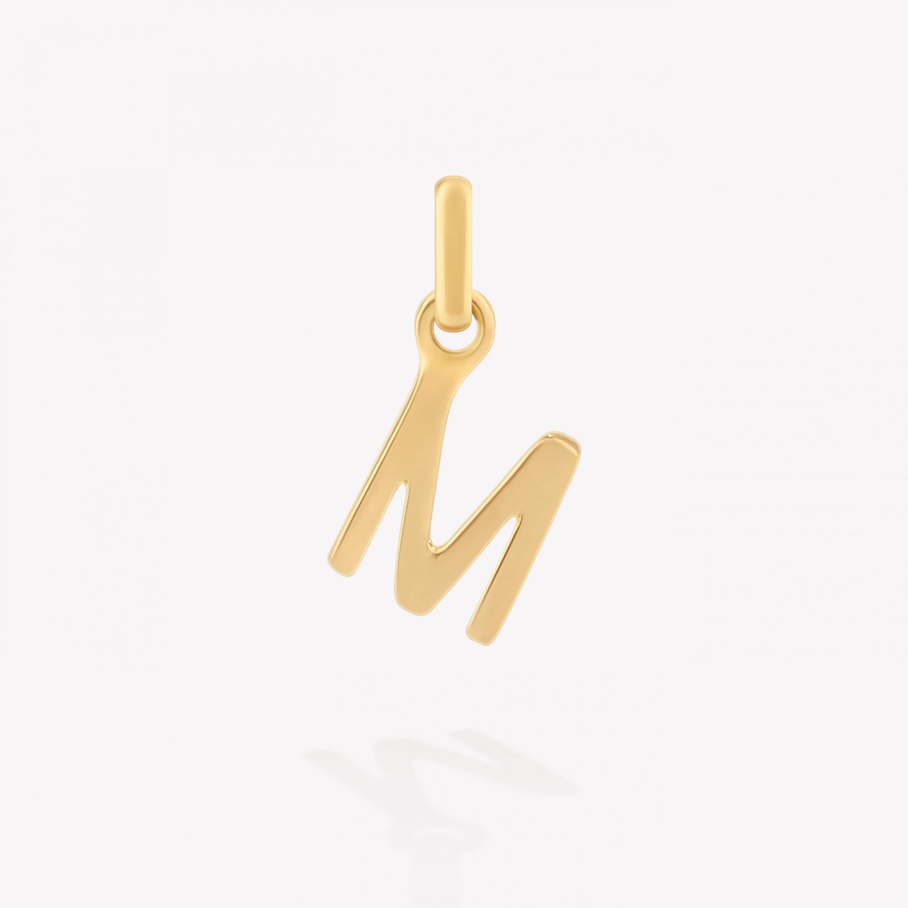Dije oro 18k amarillo, Inicial M Imprenta.