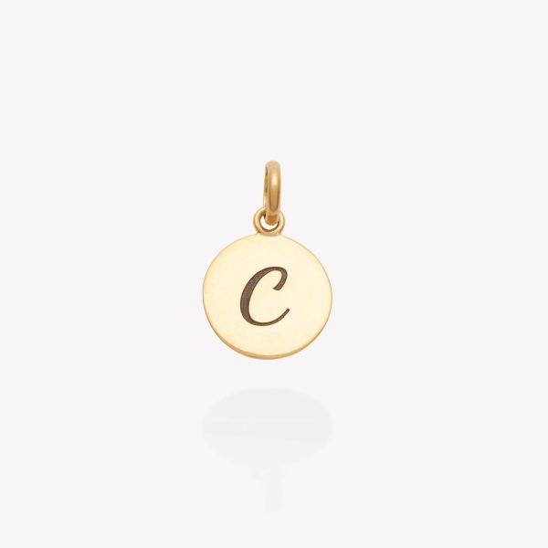Placa oro 18k amarillo, redonda 1.2 cm. con inicial C.