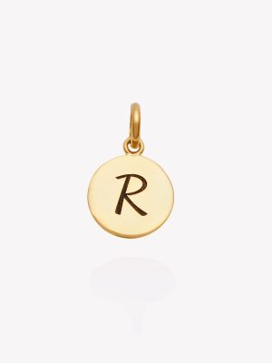 Placa redonda de 1.2 cms. inicial R, oro amarillo