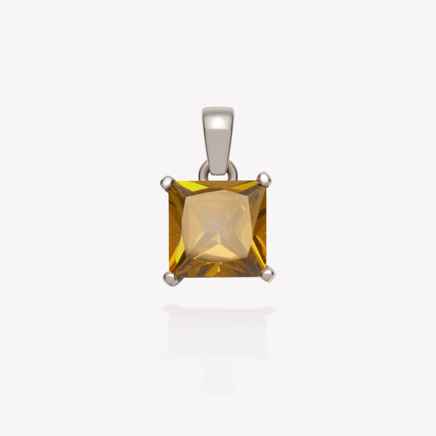 Dije oro 18k blanco, Princesa con Turmalina.