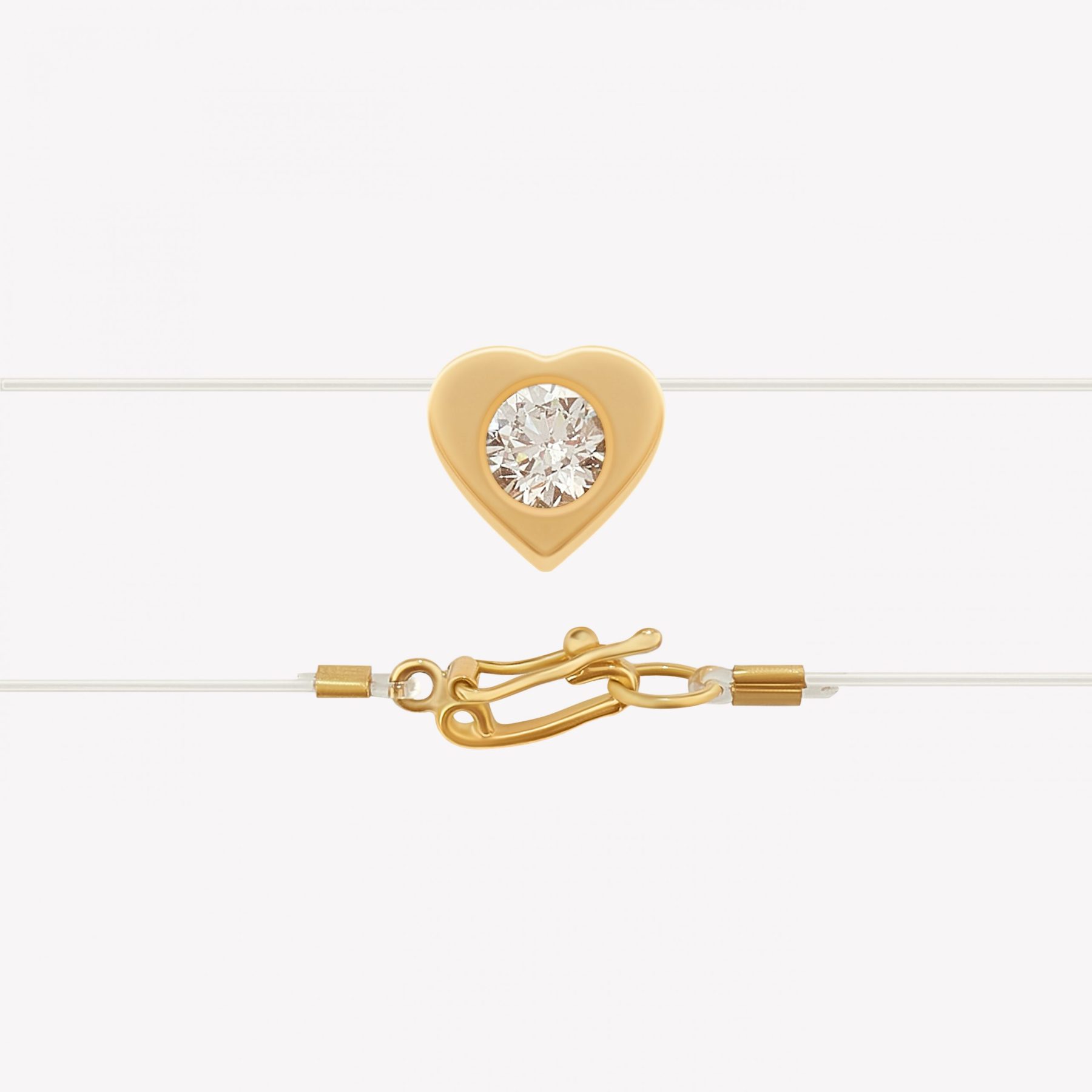 Centro oro 18k Amarillo, Punto Luce Corazón con moissanite.