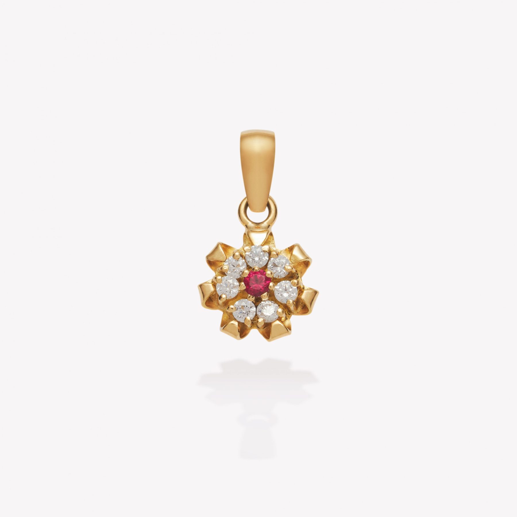 Dije oro 18k amarillo, Margarita con Rubí y Circonios.