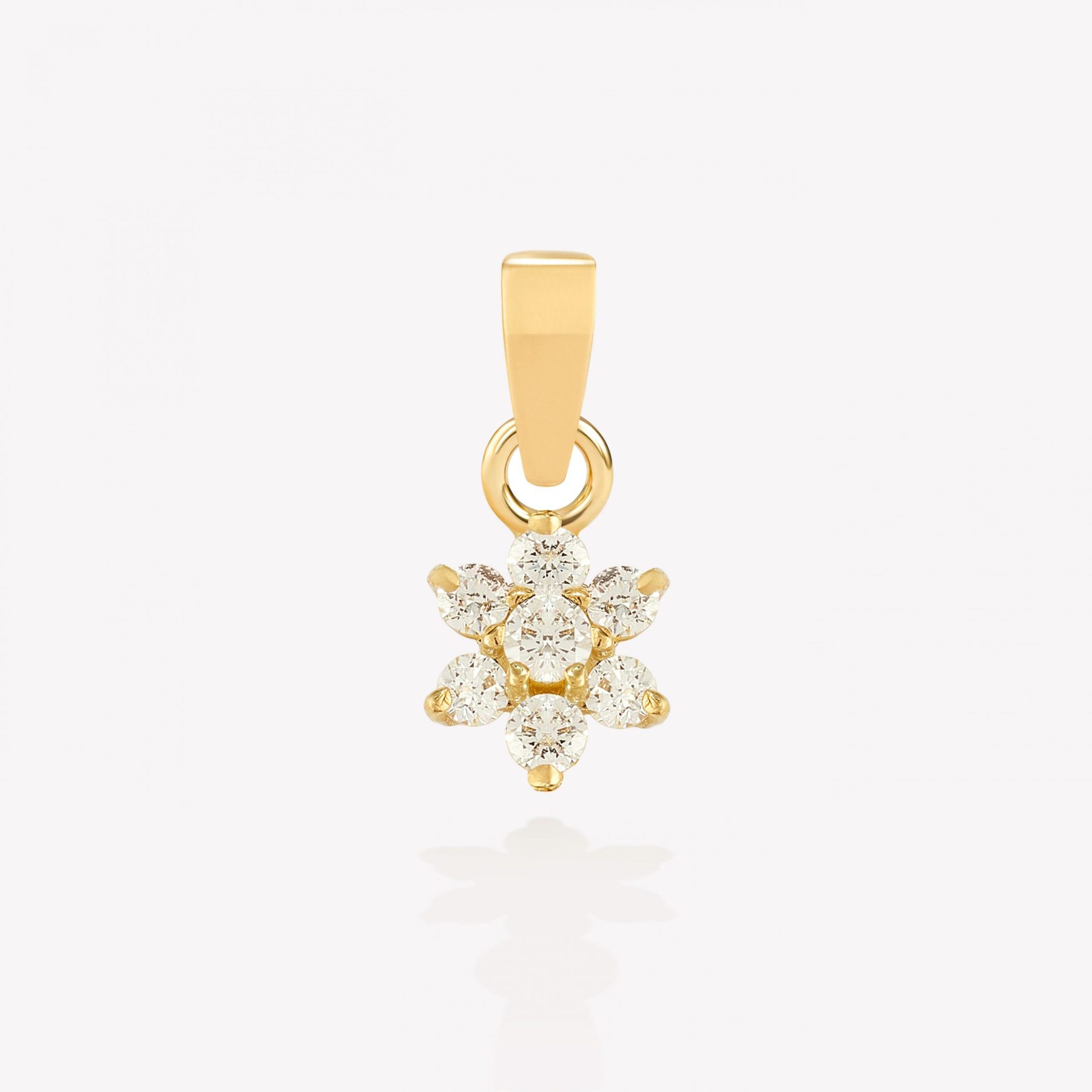 Dije oro 18k amarillo, Roseta con circonios.