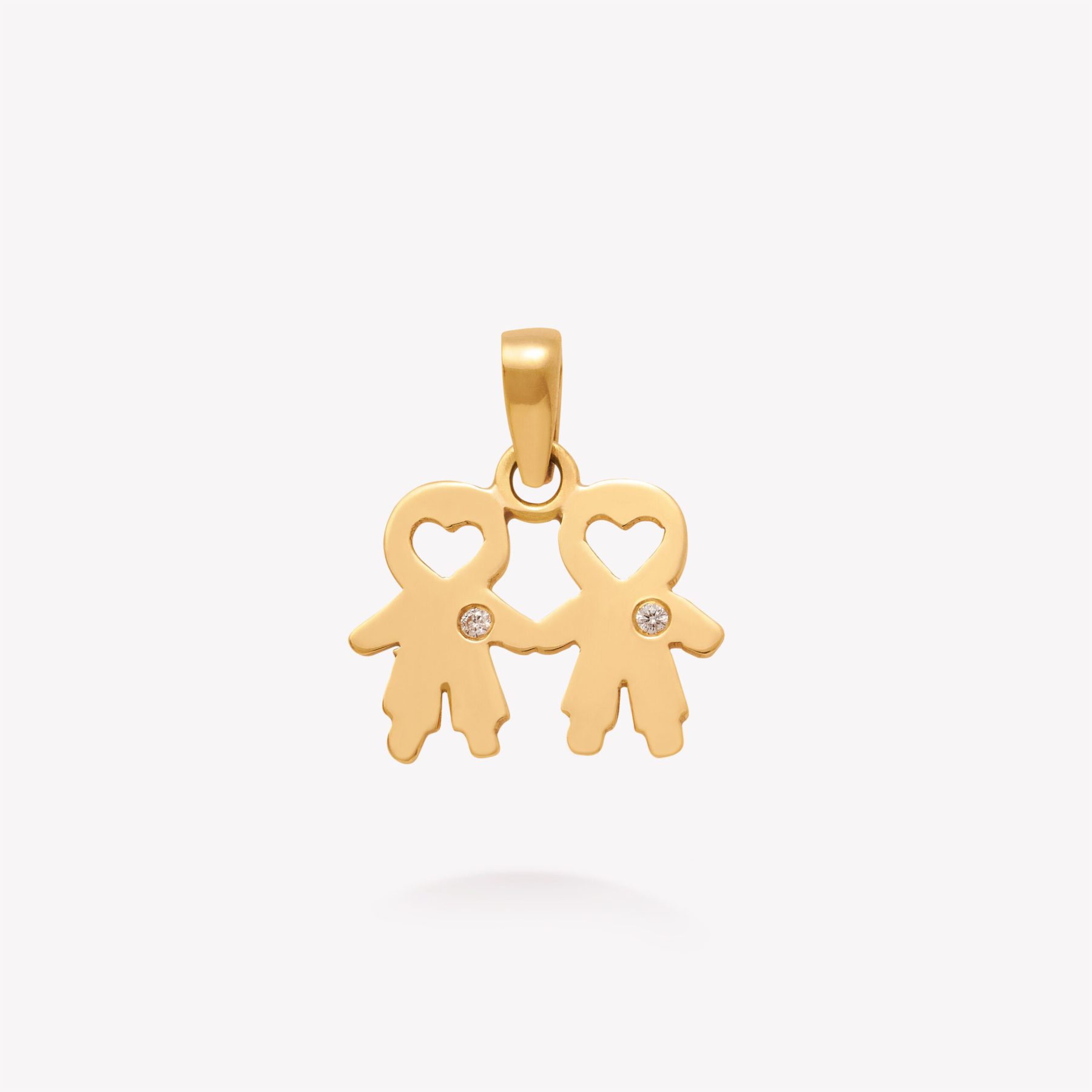 Dije oro18k amarillo, niños con brillante.