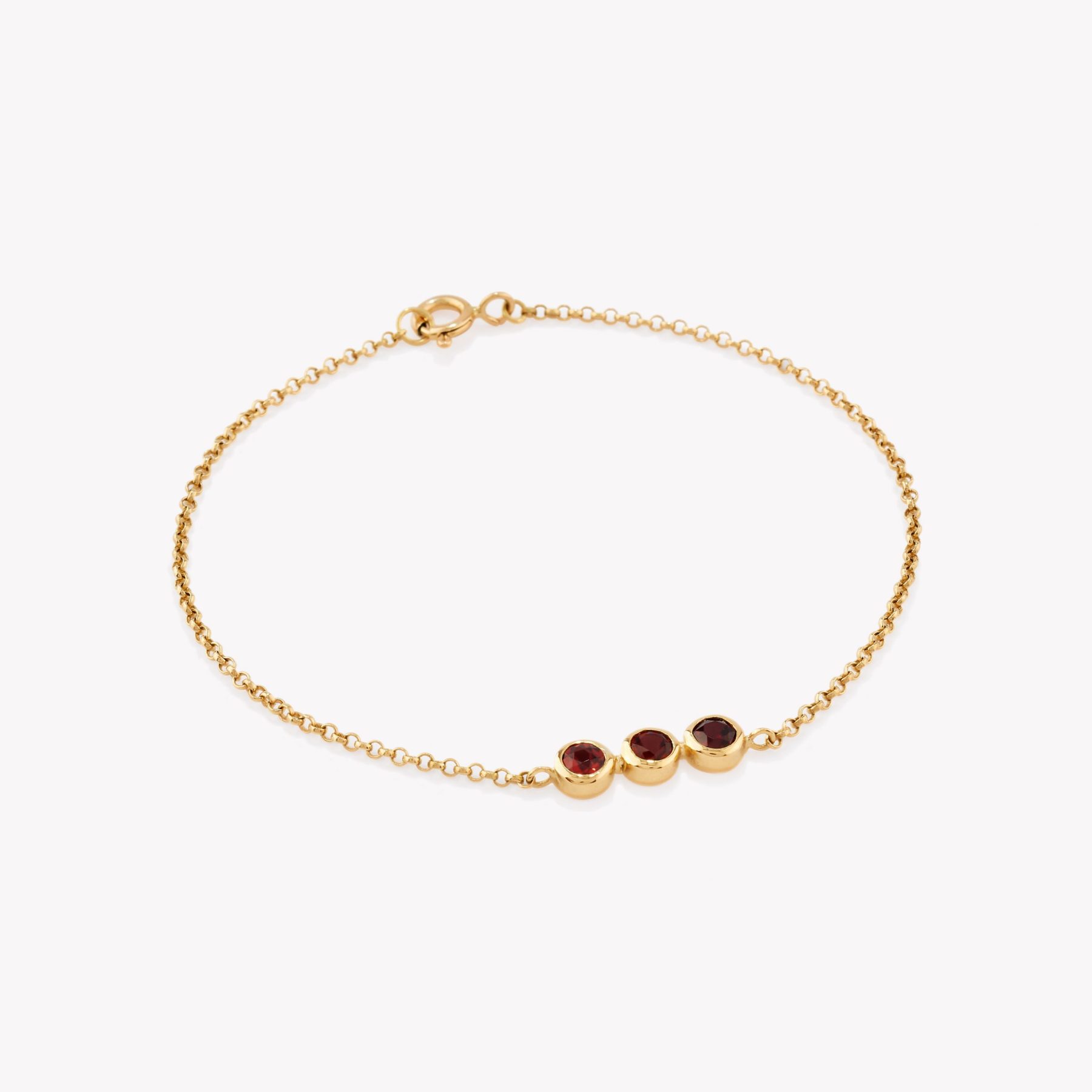 Pulsera oro 18k. amarillo con Granate.