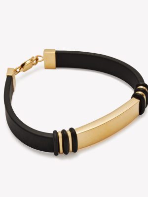 Pulsera en oro 18k. amarillo con silicona.