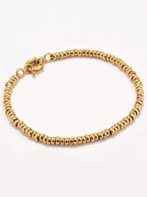 Pulsera en oro 18k. amarillo, Chaquiras.