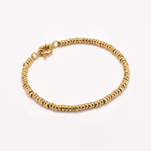 Pulsera en oro 18k. amarillo, Chaquiras.