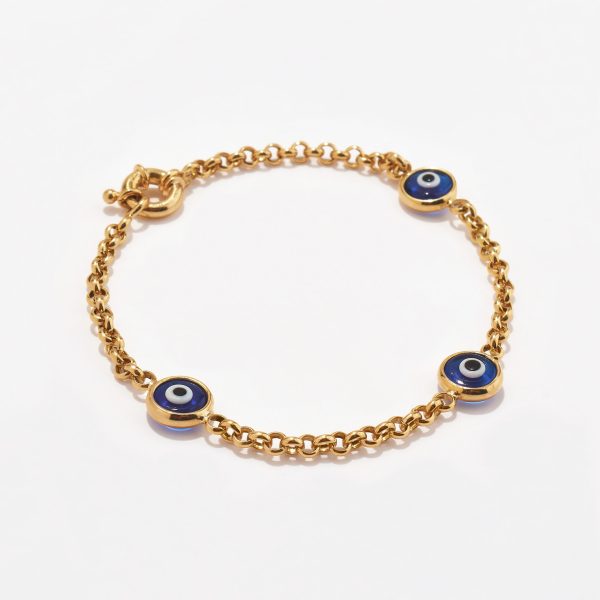 Pulsera en oro 18k. amarillo, rollo con 3 Ojos Turcos Azules.