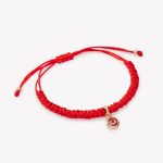 Pulsera macrame con ojo turco rojo 18k. amarillo