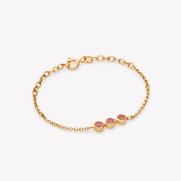 Pulsera en oro 18k. rollo con turmalina rosa.