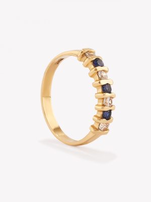 Anillo con Circonios y Zafiro Azul, Oro Amarillo