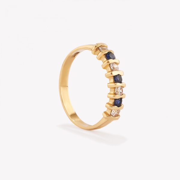 Anillo oro 18k amarillo, Circonios y Zafiro Azul.