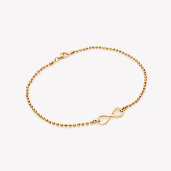 Tobillera en 18k. amarillo bolitas Infinito.
