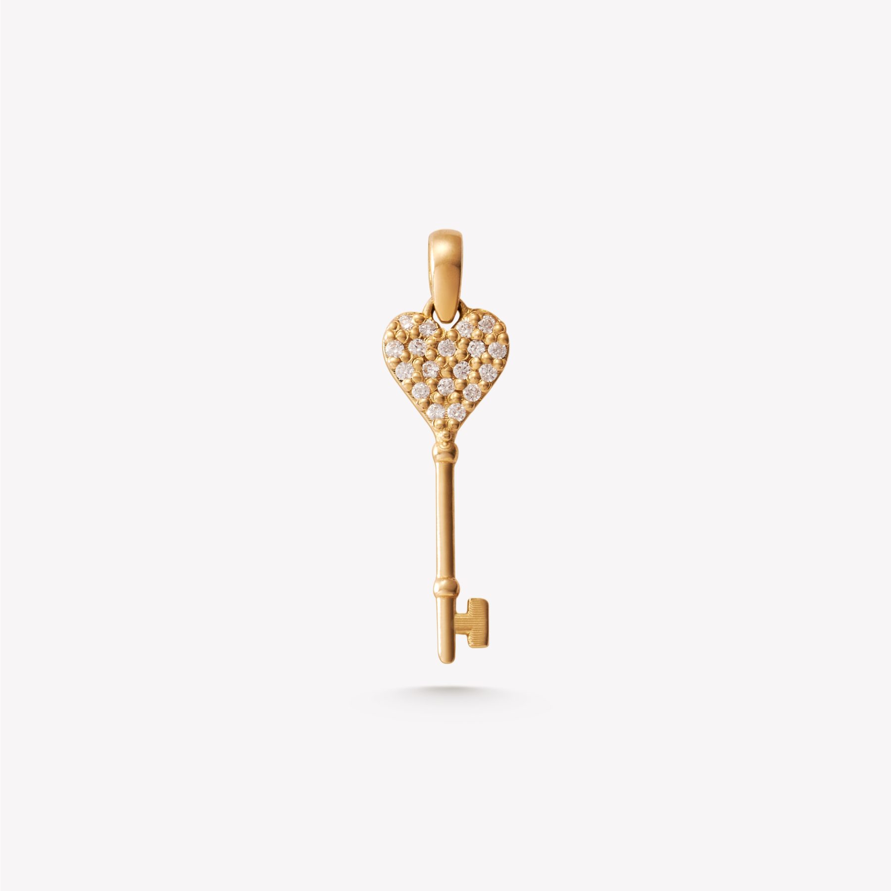 Dije oro 18k amarillo, LLAVE CORAZÓN con cristales