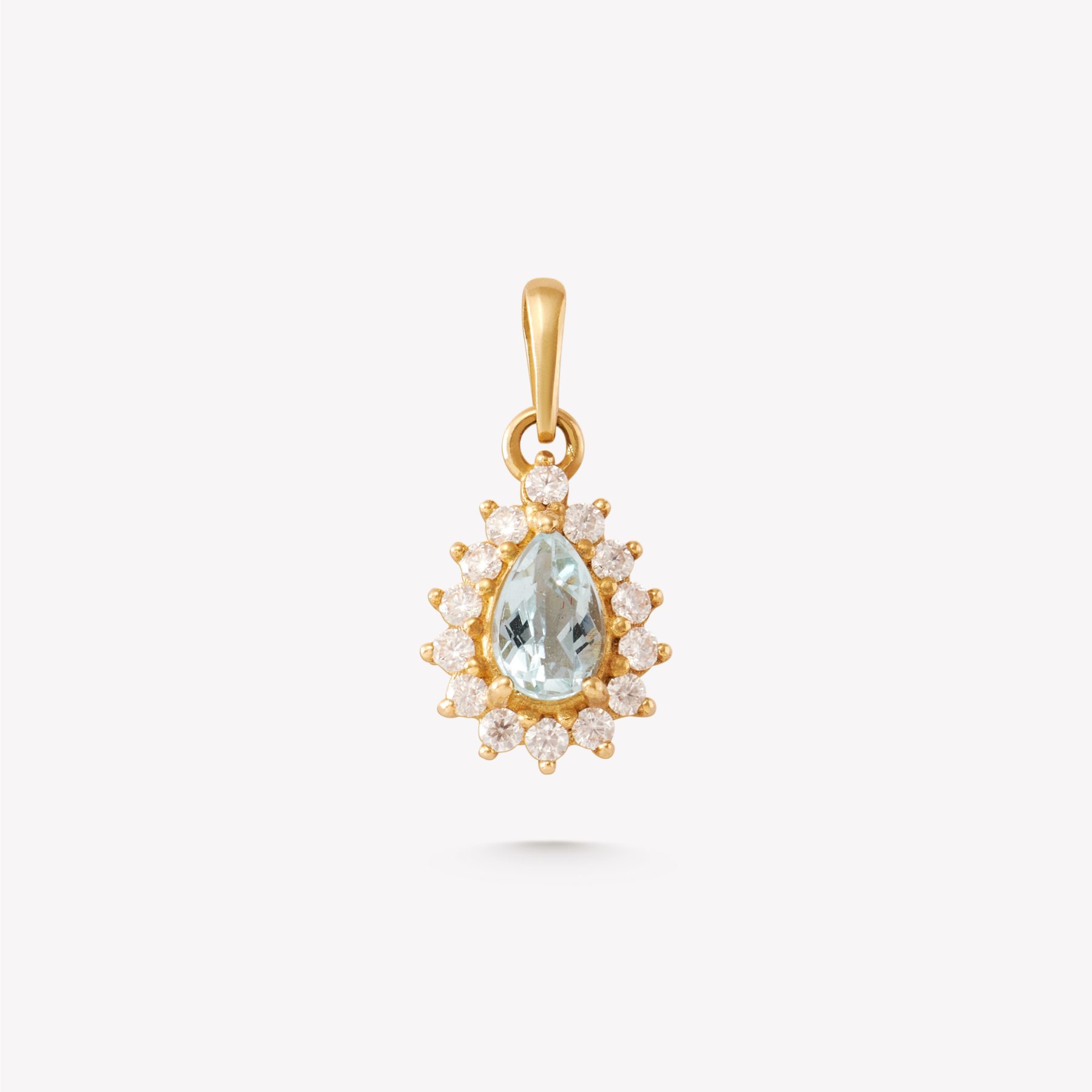 Dije oro 18k amarillo, roseta gota con Aguamarina