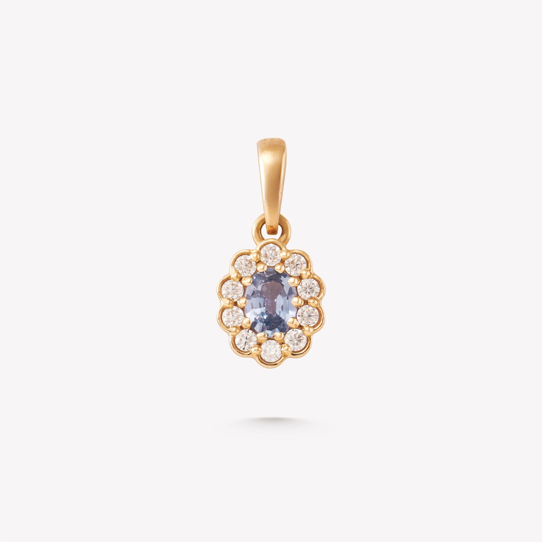 Dije oro 18k. Lady Di Piedras zafiros azules