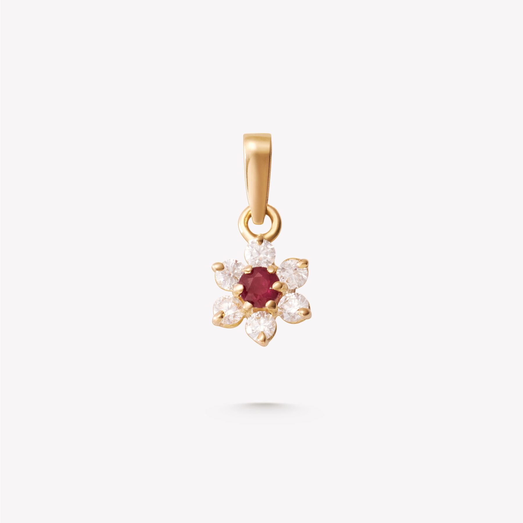 Dije oro 18k amarillo, Roseta con RUBÍ