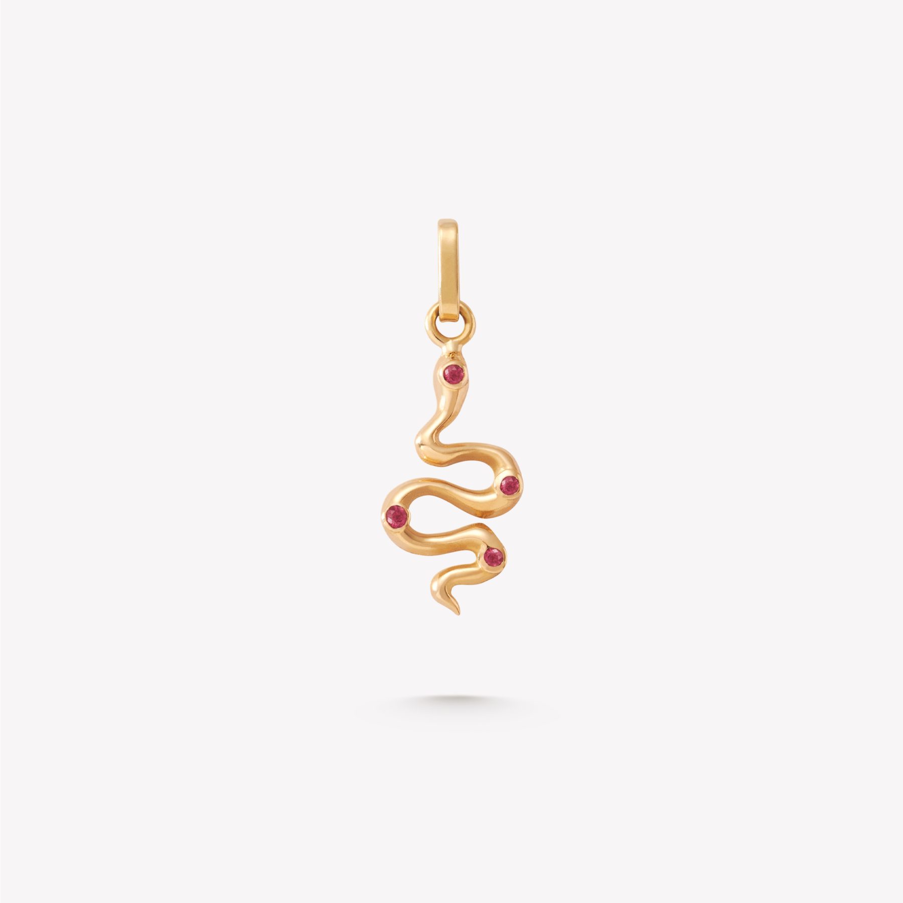 Dije Serpiente de oro 18k con 4 Rubíes