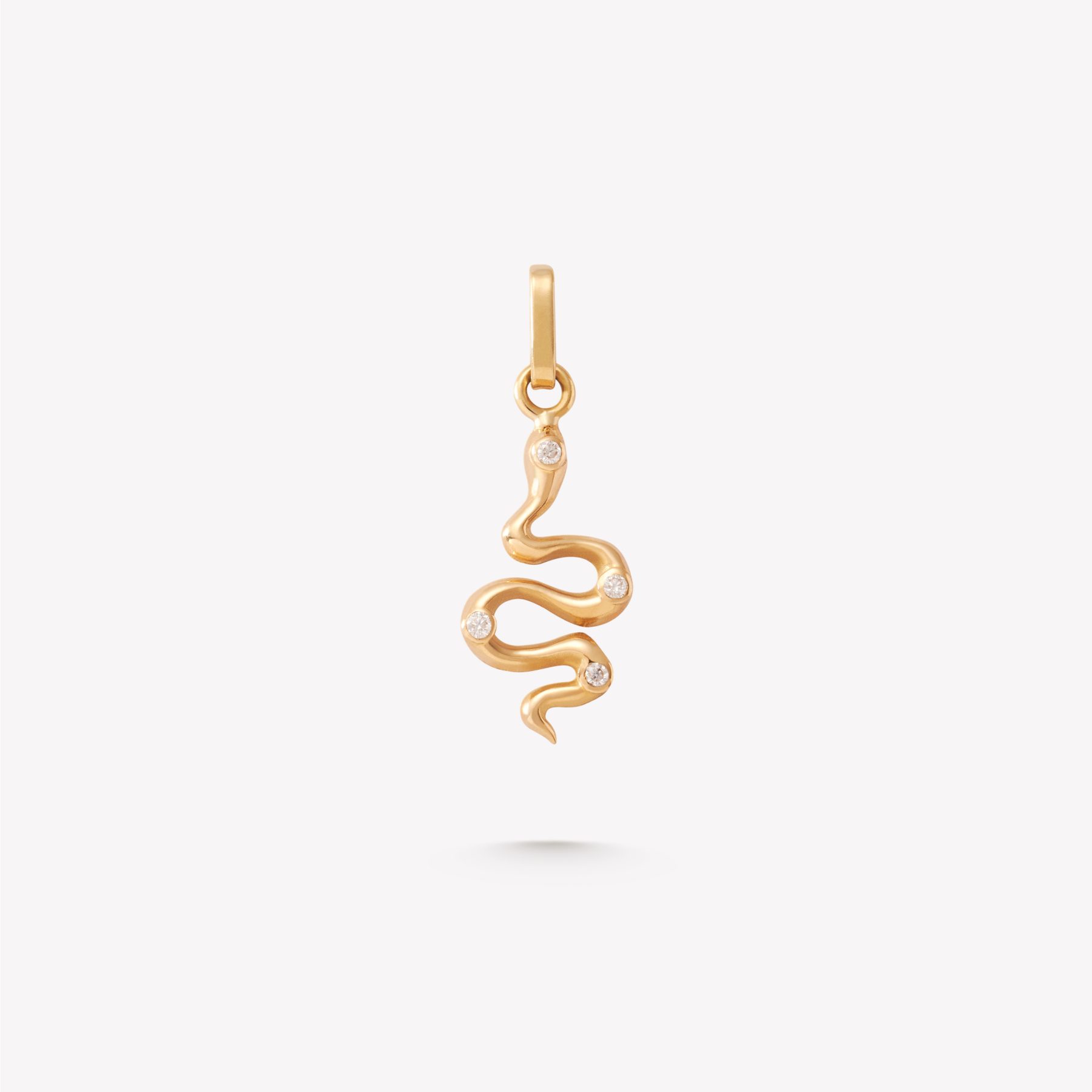Dije Serpiente de oro 18k con 4 Brillantes Moissanitas.