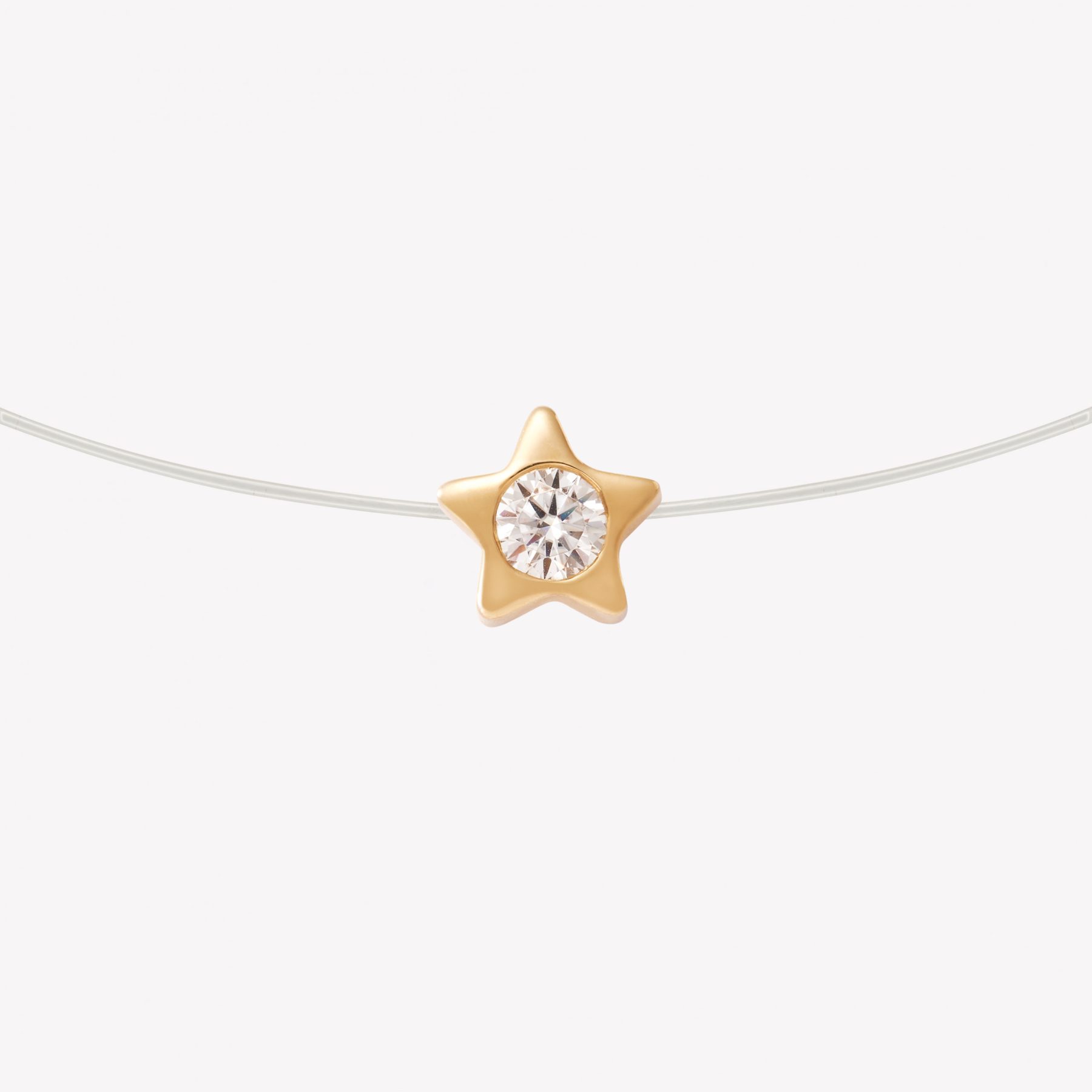 Dije oro 18k amarillo, Punto luce ESTRELLA