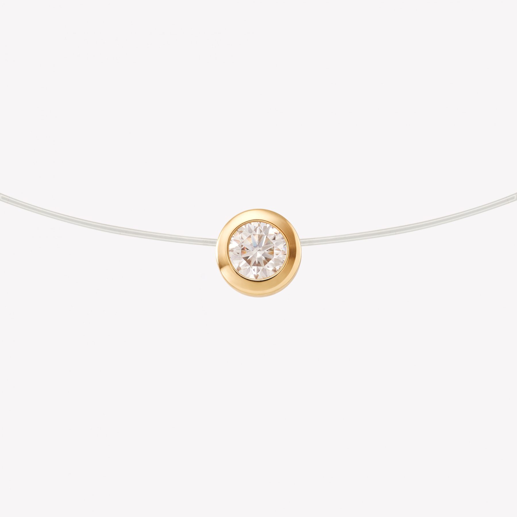 Dije oro 18k amarillo, Punto luce REDONDO moissanita.