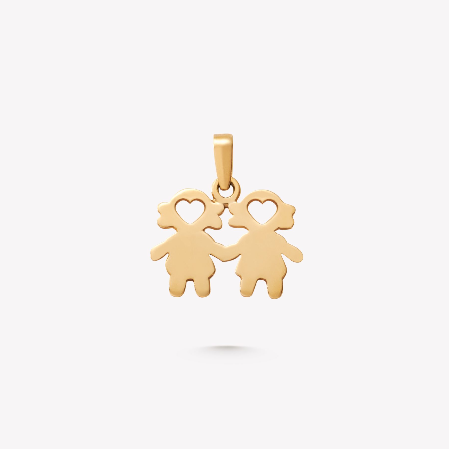 Dije oro 18k amarillo, NIÑA Y NIÑA unidas.