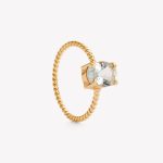 Anillo oro 18k amarillo, entorchado con agua marina.