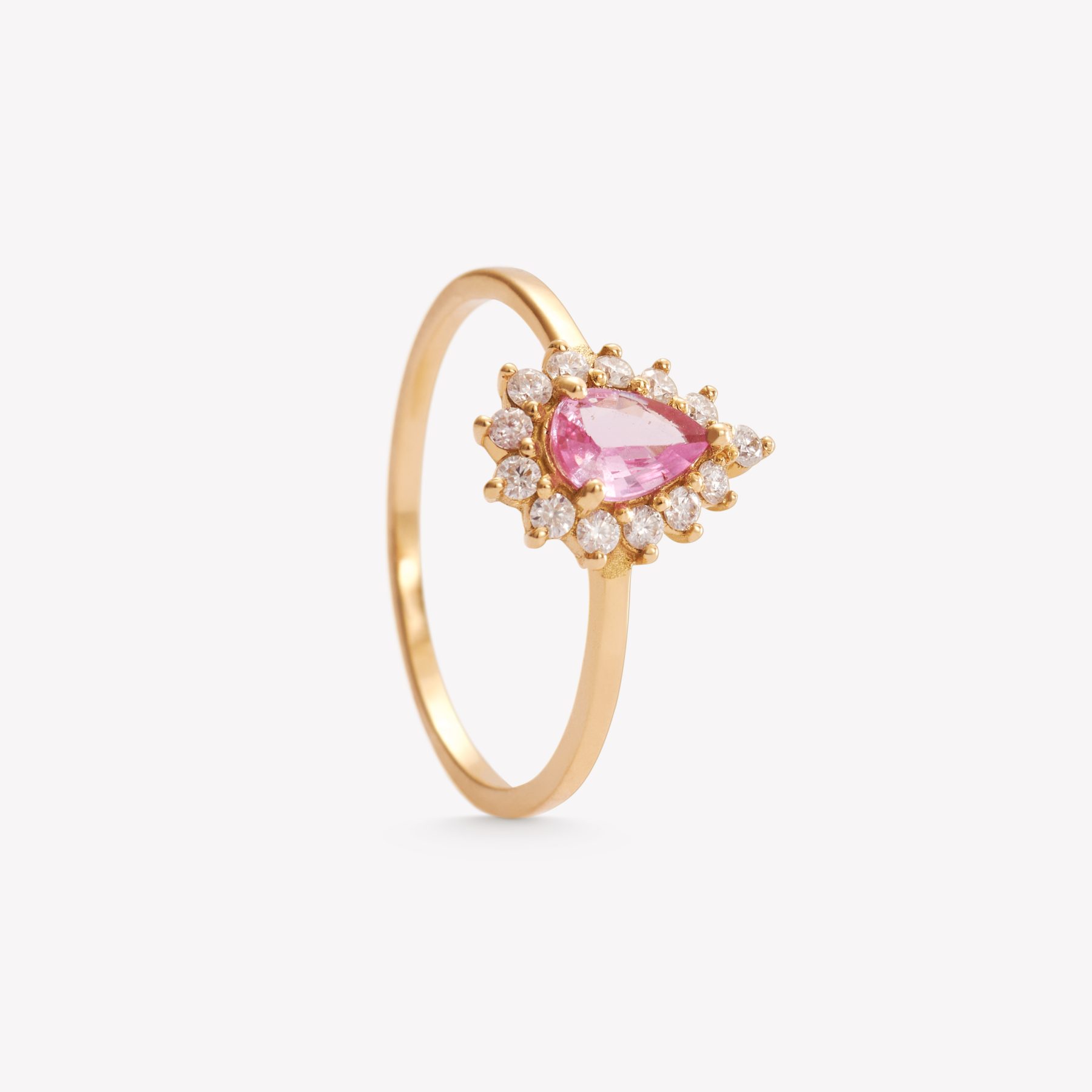 Anillo oro 18k amarillo, Roseta con zafiro rosa.