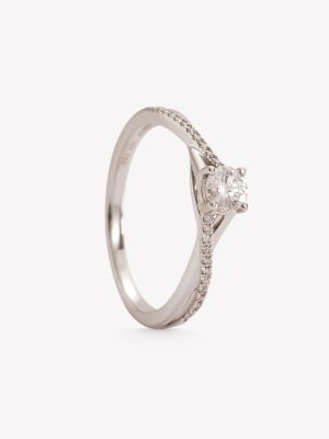 Anillo oro 18k blanco, compromiso con brillantes.