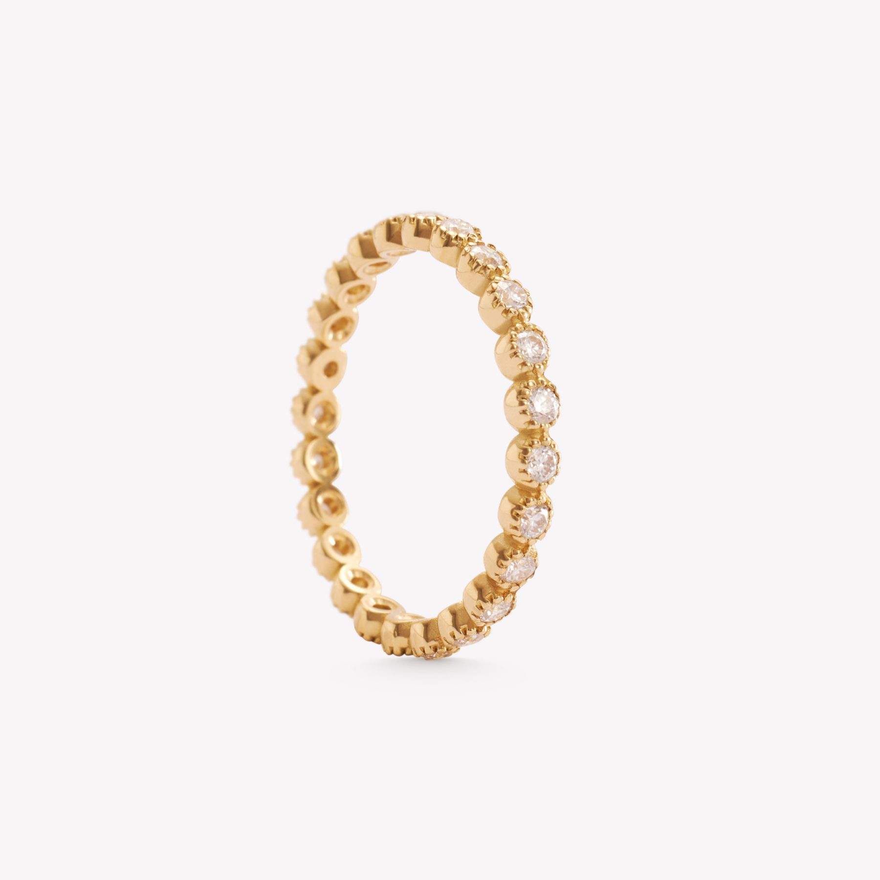 Anillo oro 18k amarillo, rivier con moissanitas.