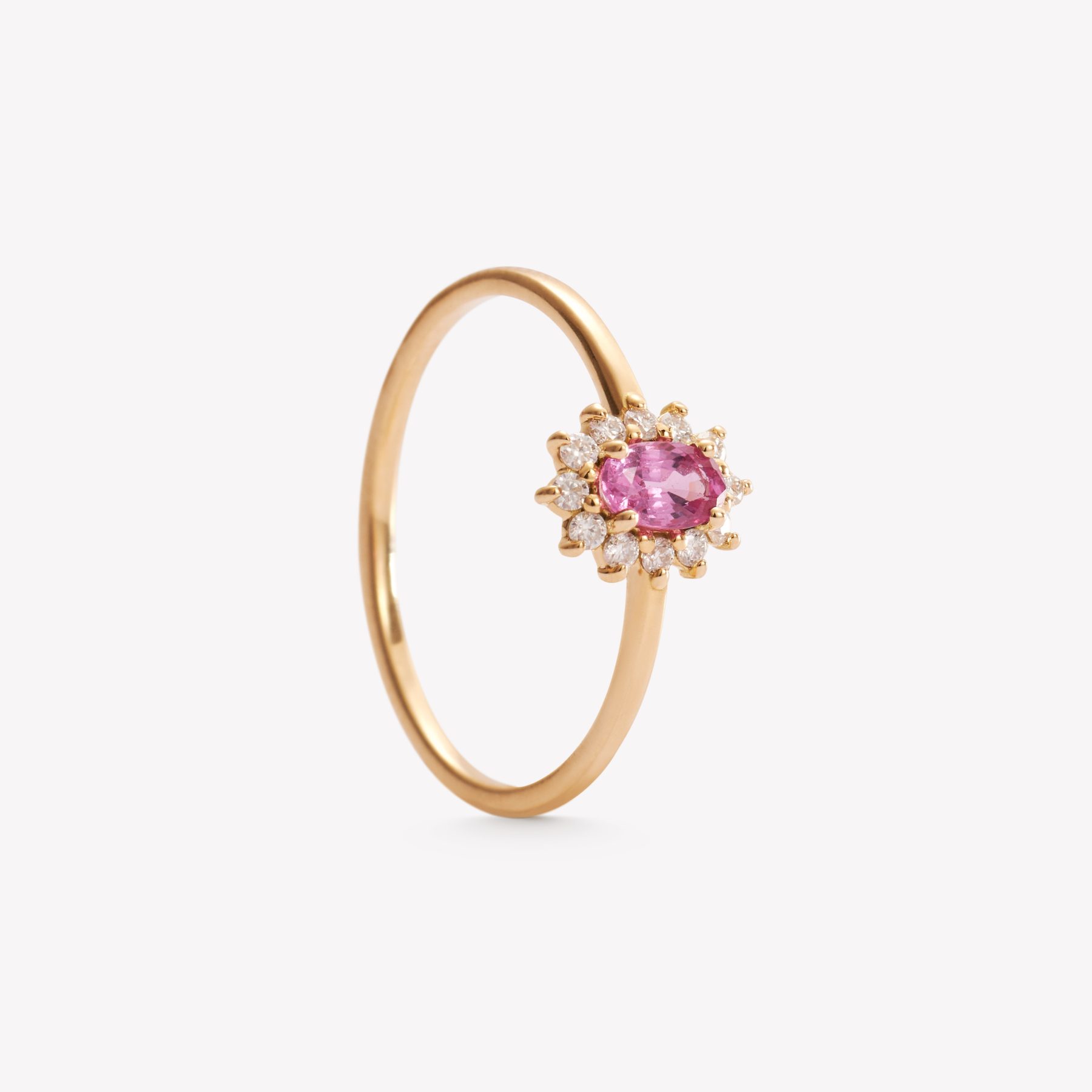 Anillo oro 18k, mini Roseta con zafiro rosa.