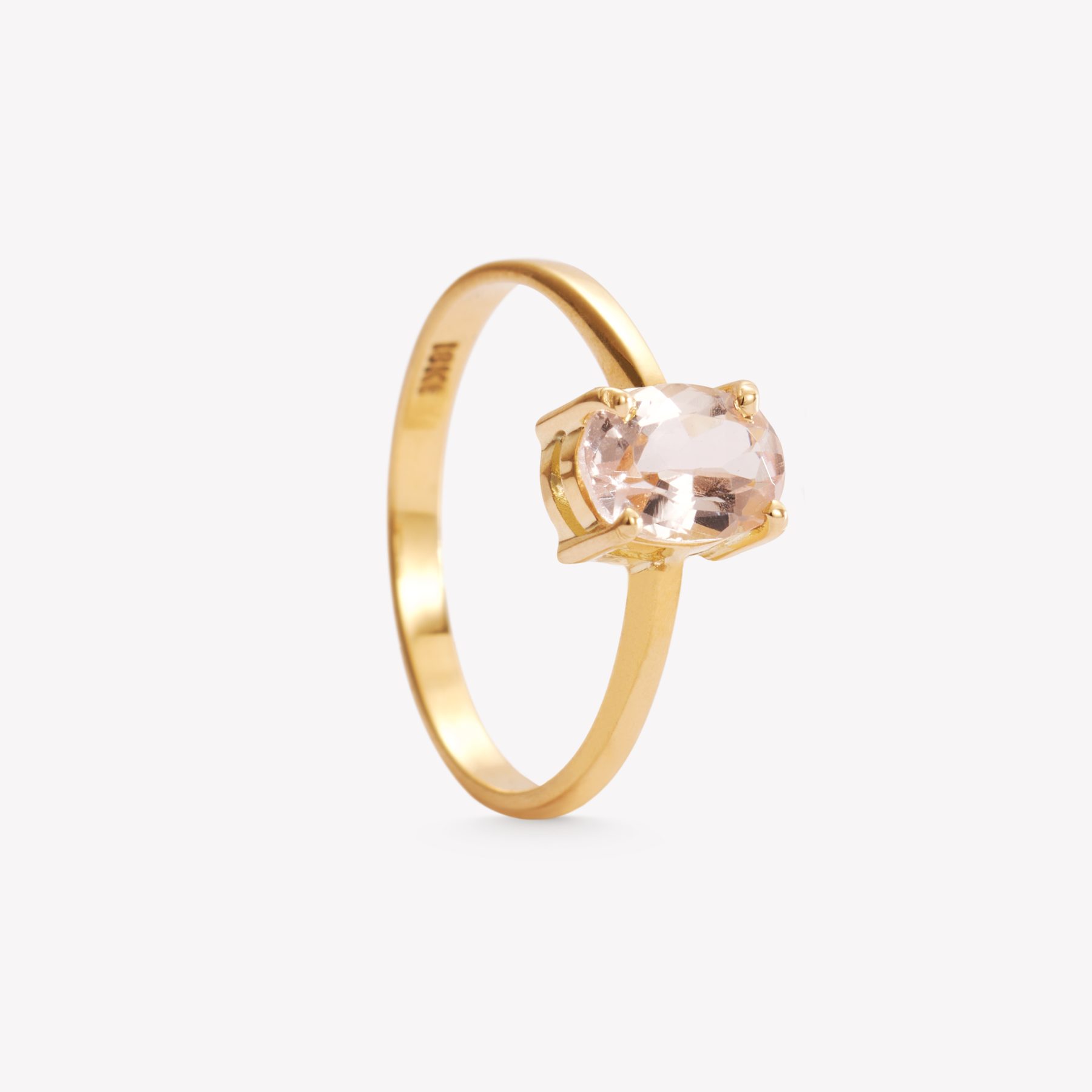 Anillo oro 18k amarillo, galería y piedra Morganita.