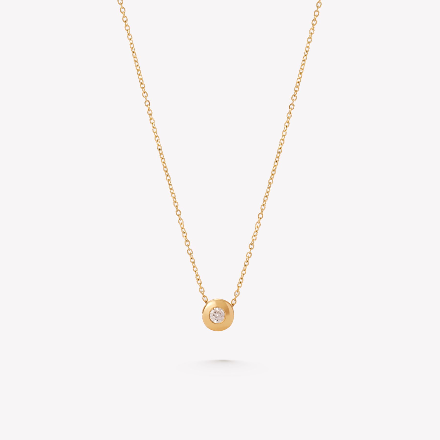 Cadena oro 18k amarillo. Martillada con centro Brillante.